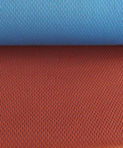 Kvadrat Febrik Plecto 564 roestbruin burnt orange blauw