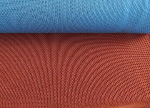 Kvadrat Febrik Plecto 564 roestbruin burnt orange blauw