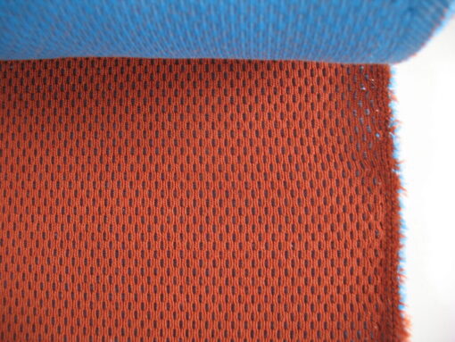 Kvadrat Febrik Plecto 564 roestbruin burnt orange blauw