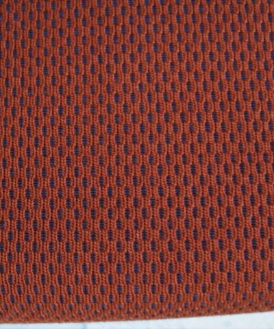 Kvadrat Febrik Plecto 564 roestbruin burnt orange blauw