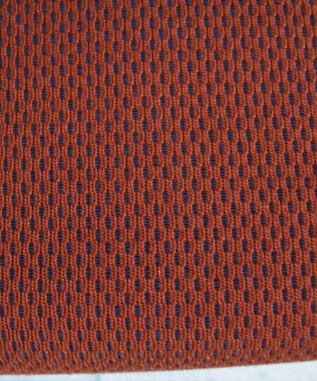Kvadrat Febrik Plecto 564 roestbruin burnt orange blauw