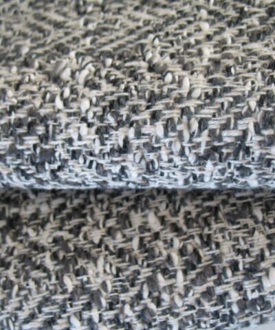 Bouclé meubelstof creme grijs