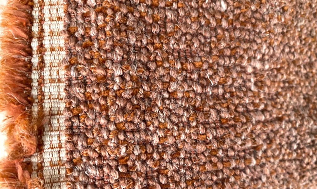 De Ploeg Serra 12 oranje roze bouclé