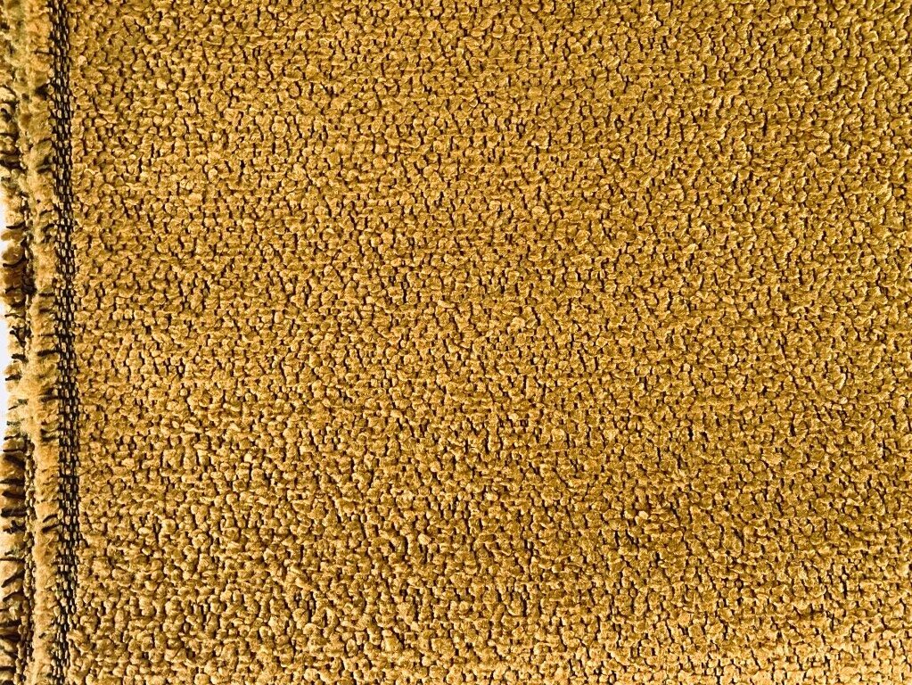 meubelstof bouclé oranje geel