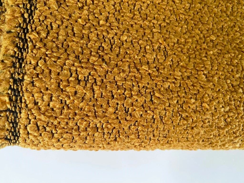 meubelstof bouclé oranje geel