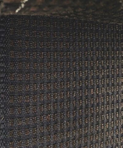 De Ploeg bruin zwart geblokt patroon